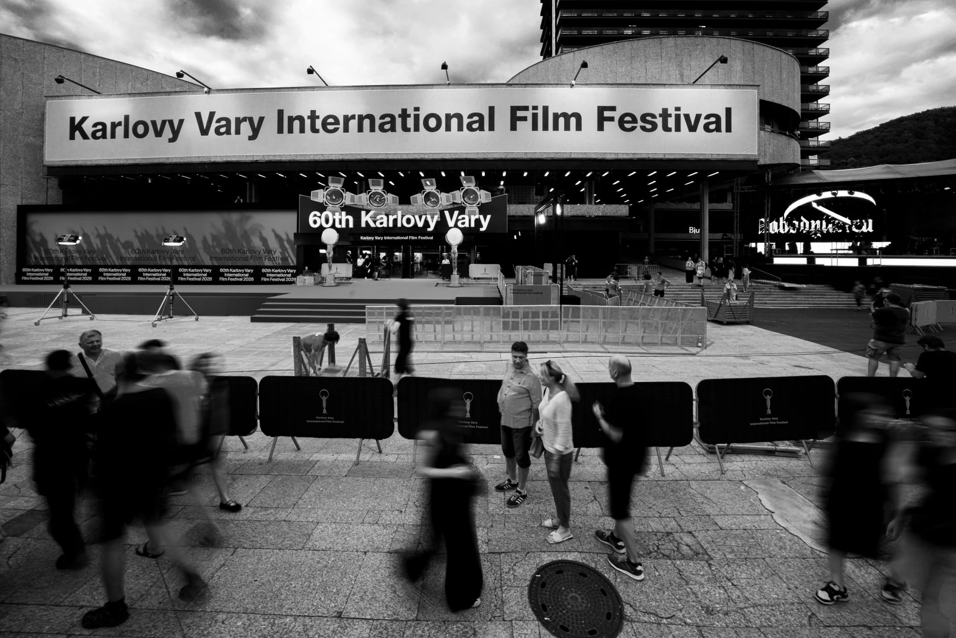 People at the 60th Karlovy Vary International Film Festival in black and white.